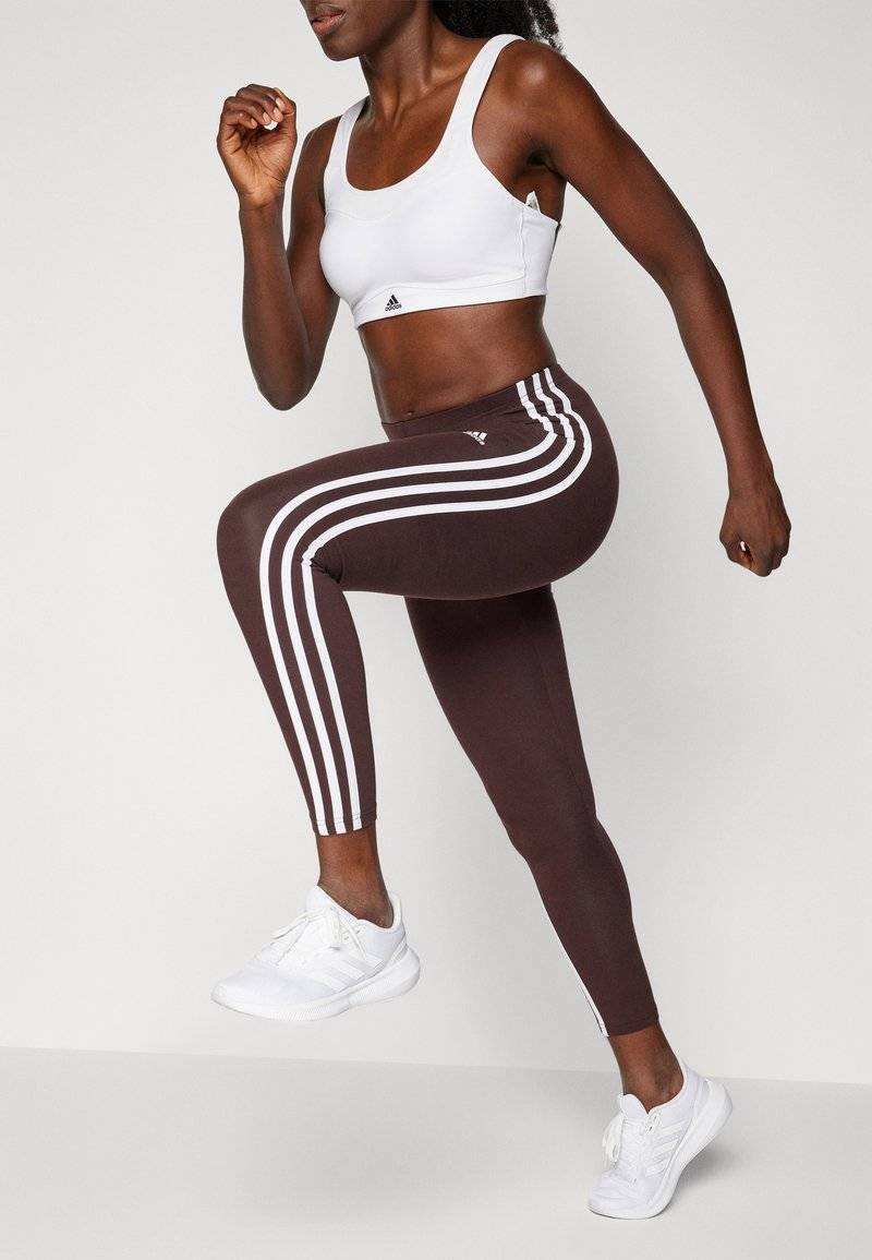 adidas Sportswear adidas Sportswear ESSENTIALS 3 STRIPES HIGH WAISTED - Leggings - shadow brown Bis zu 65% Rabatt