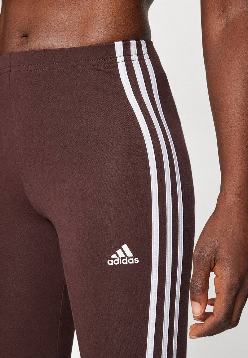 adidas Sportswear adidas Sportswear ESSENTIALS 3 STRIPES HIGH WAISTED - Leggings - shadow brown Bis zu 65% Rabatt