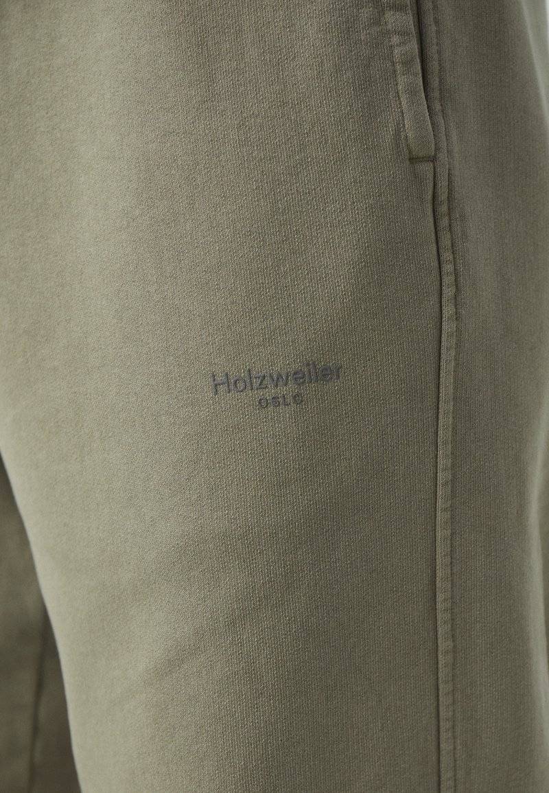 Holzweiler Holzweiler LAGOON OSLO TROUSERS UNISEX - Tracksuit bottoms - green 50% Rabatt für begrenzte Zeit