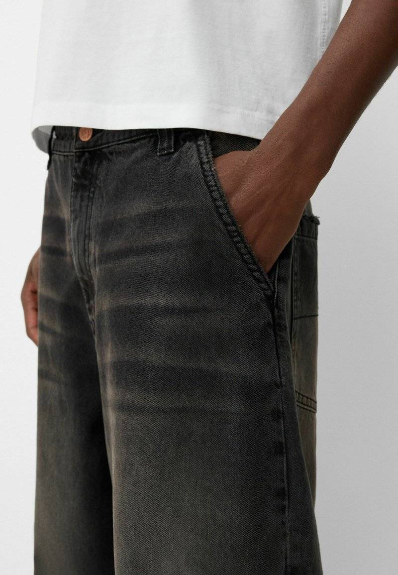 Bershka Bershka Relaxed fit jeans - black denim im Angebot