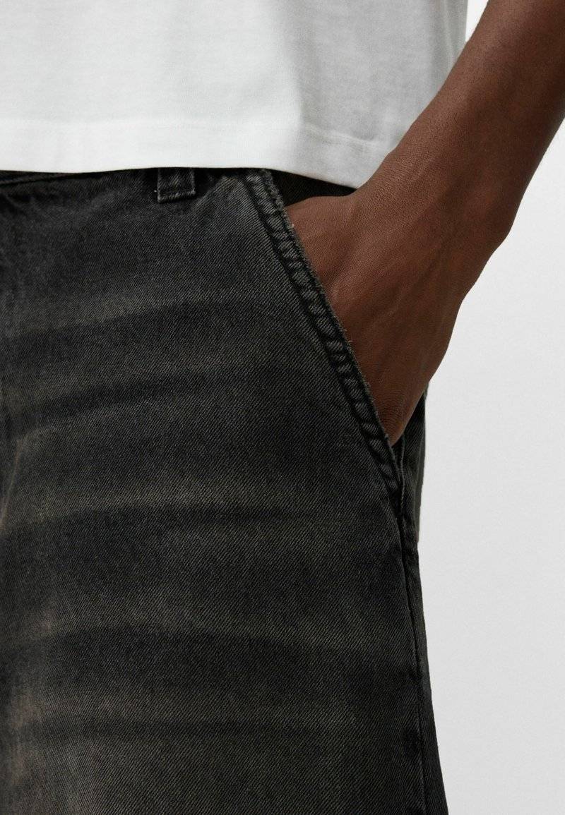 Bershka Bershka Relaxed fit jeans - black denim im Angebot