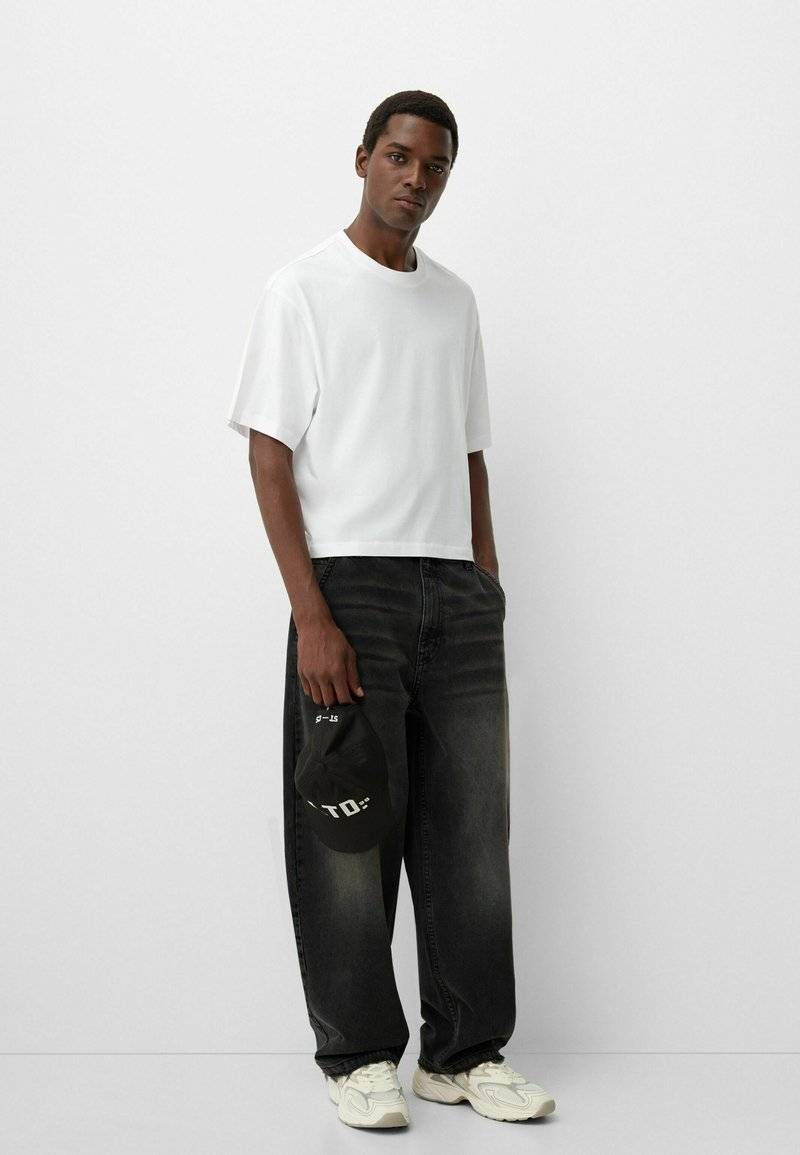 Bershka Bershka Relaxed fit jeans - black denim im Angebot