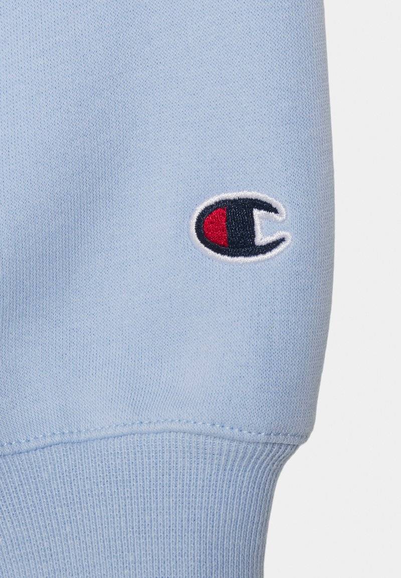 Champion Champion EXCLUSIVE CREWNECK UNISEX - Sweatshirt - light blue VIP-Rabatte