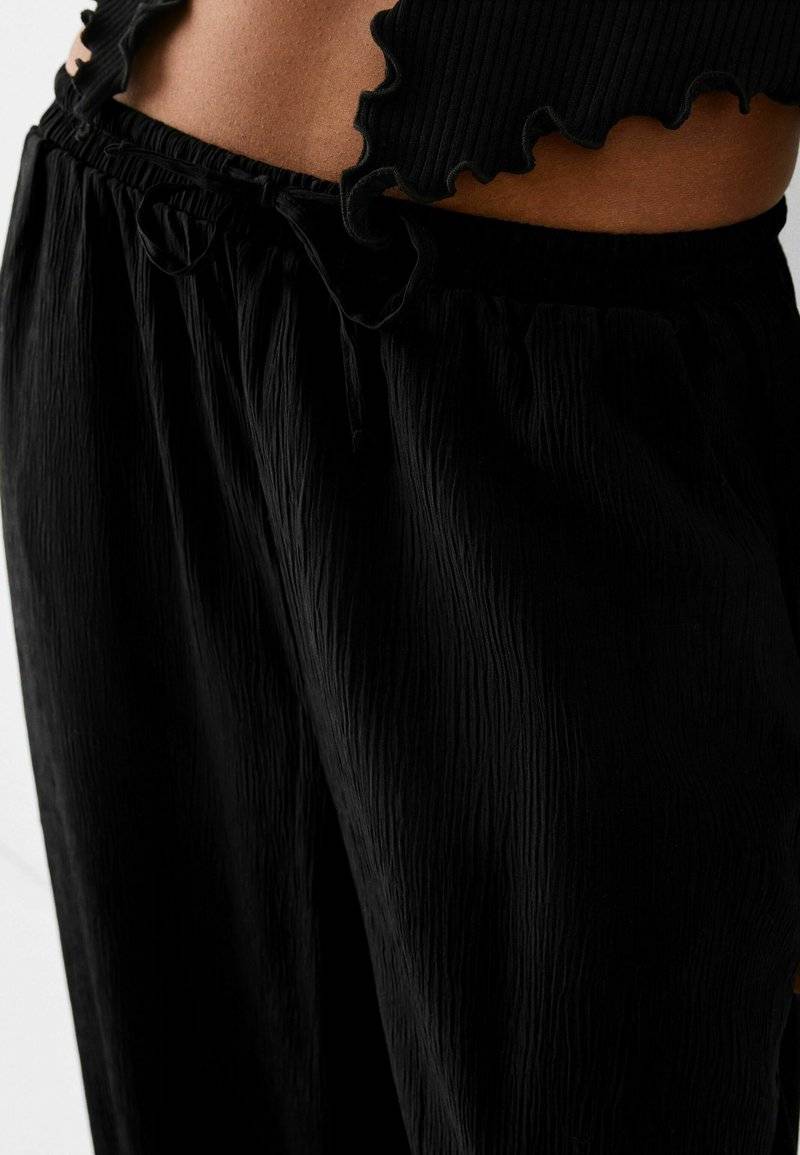 Bershka Bershka Trousers - black Kostenloser Versand