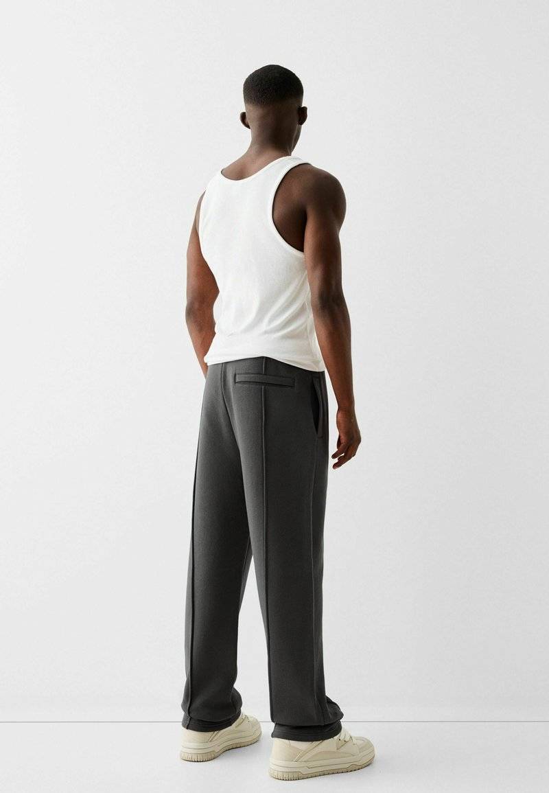 Bershka Bershka WIDE - Tracksuit bottoms - dark grey Günstig kaufen