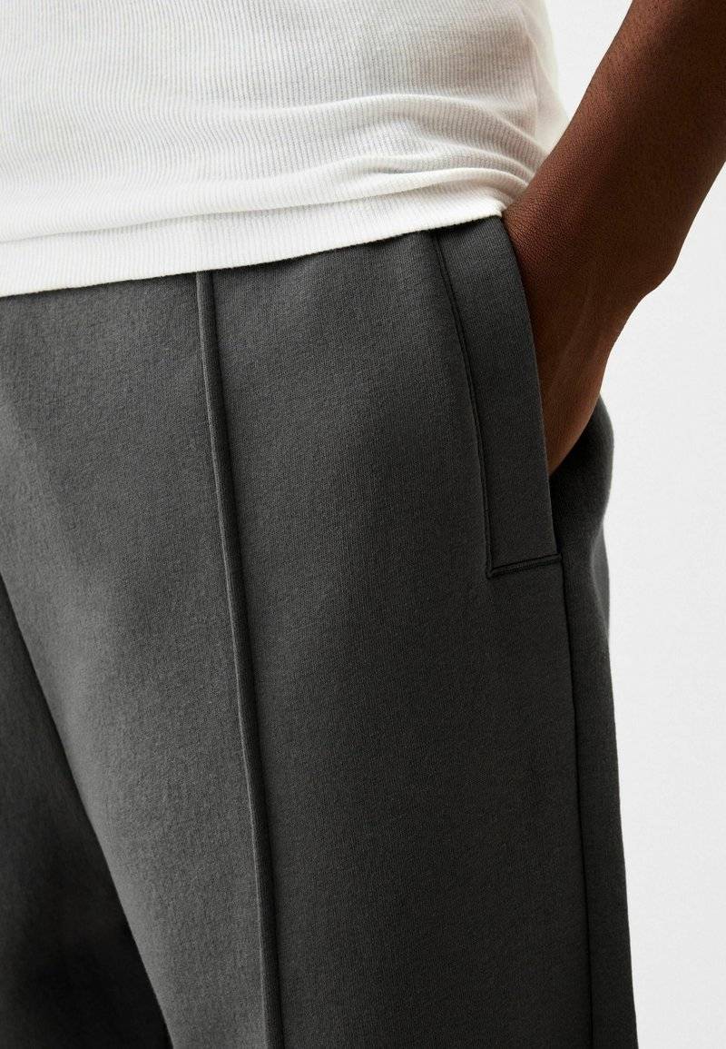 Bershka Bershka WIDE - Tracksuit bottoms - dark grey Günstig kaufen