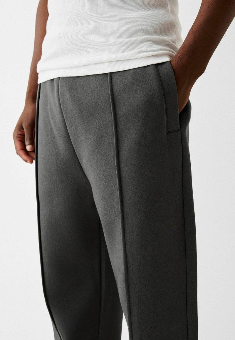 Bershka Bershka WIDE - Tracksuit bottoms - dark grey Günstig kaufen