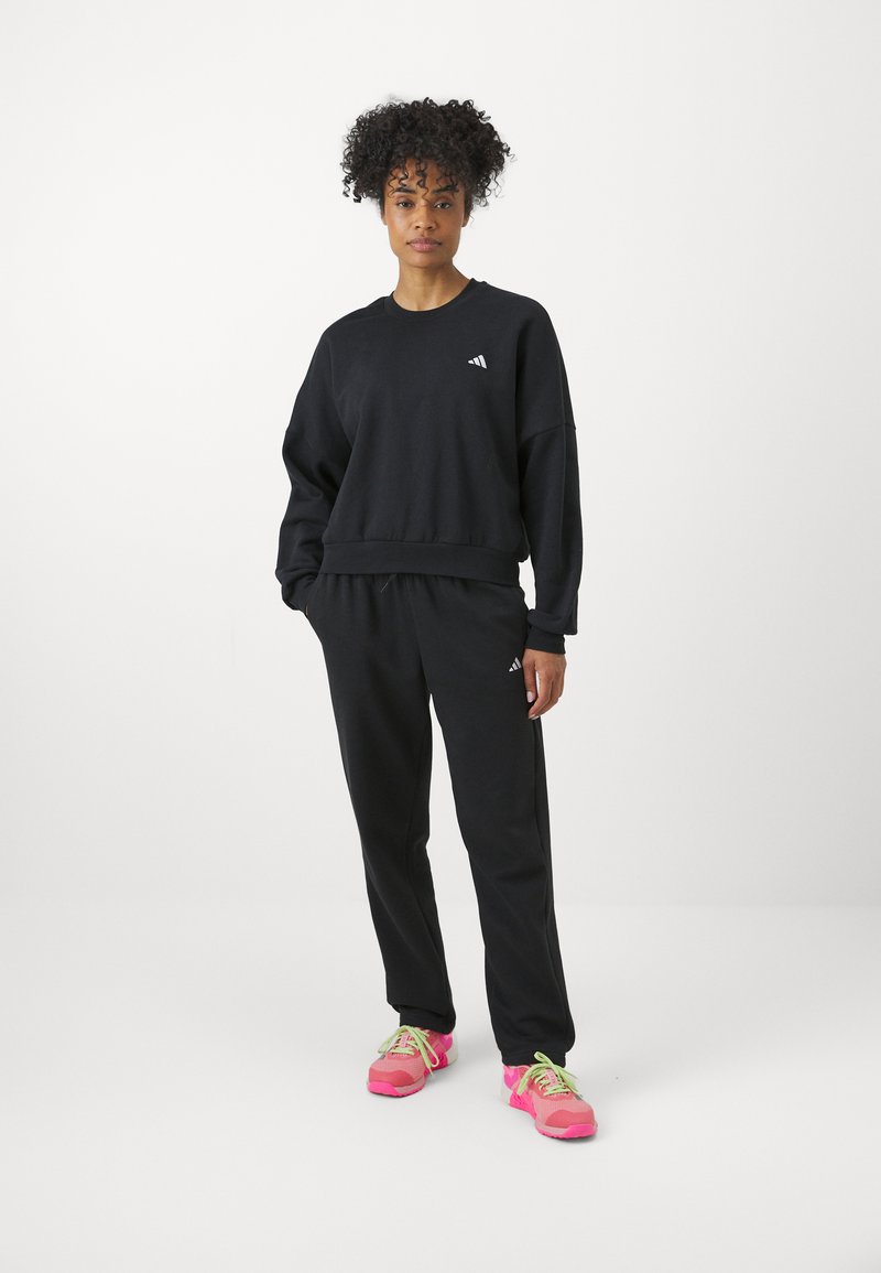 adidas Sportswear adidas Sportswear ESSENTIALS SMALL LOGO FEEL COZY OPEN HEM PANT - Tracksuit bottoms - black Hotsell