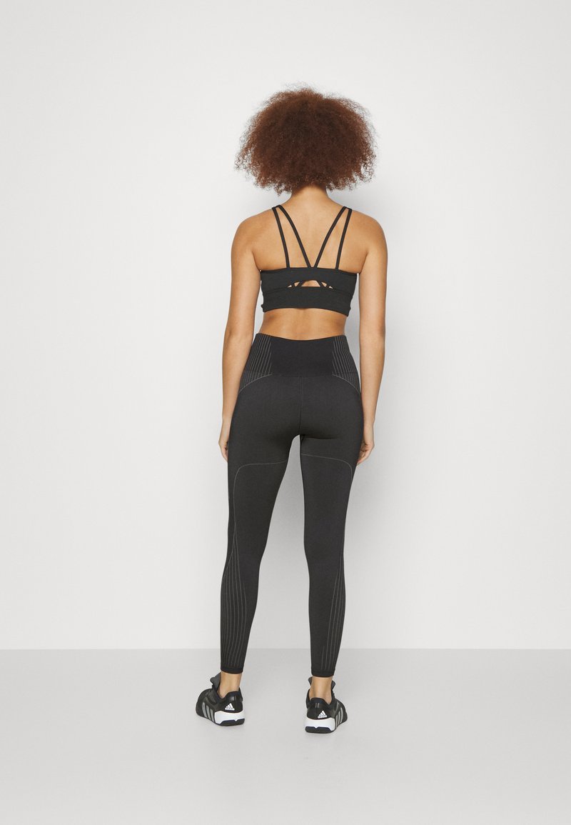 adidas Performance adidas Performance SEAMLESS BRANDED 7/8 - Leggings - black 50% Rabatt mit kostenlosem Versand