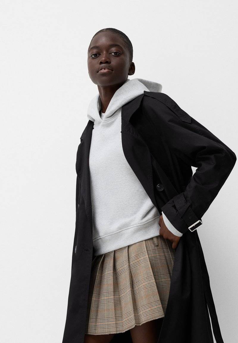 Bershka Bershka Trenchcoat - black Fabrikpreis