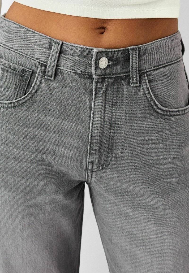 Bershka Bershka Flared Jeans - mottled dark grey Rabatt