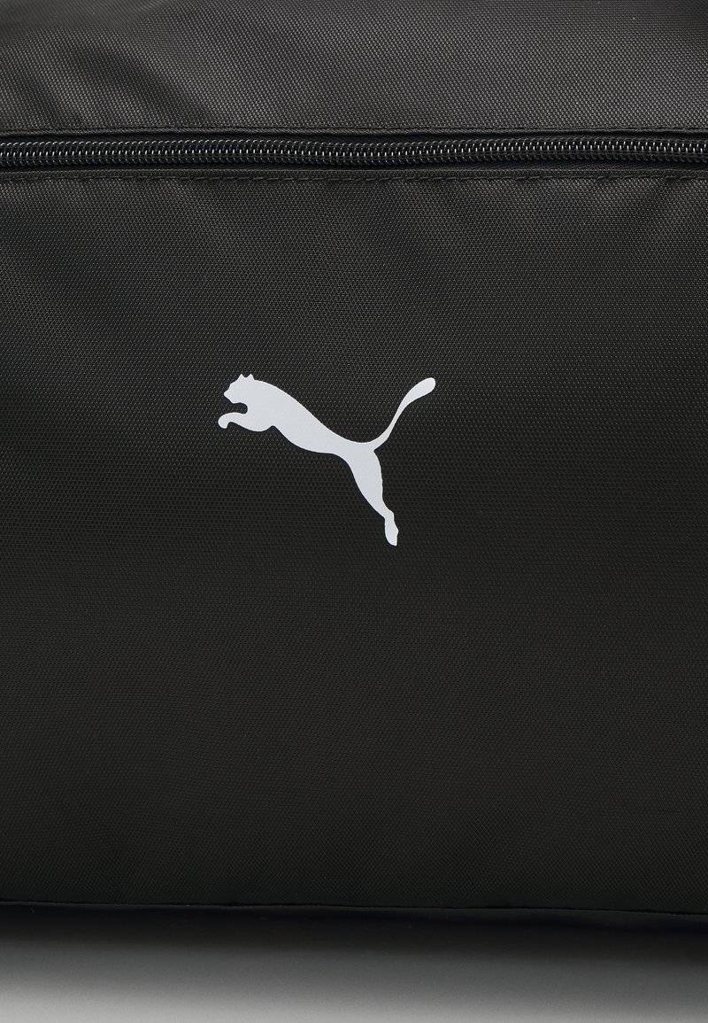 Puma Puma SPORT BAG - Sports bag - black Große Rabatte
