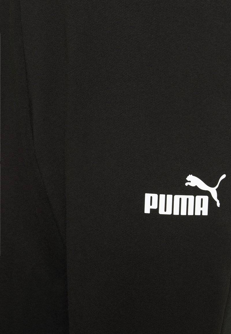 Puma Puma CAPRI - 3/4 sports trousers - black Günstig kaufen