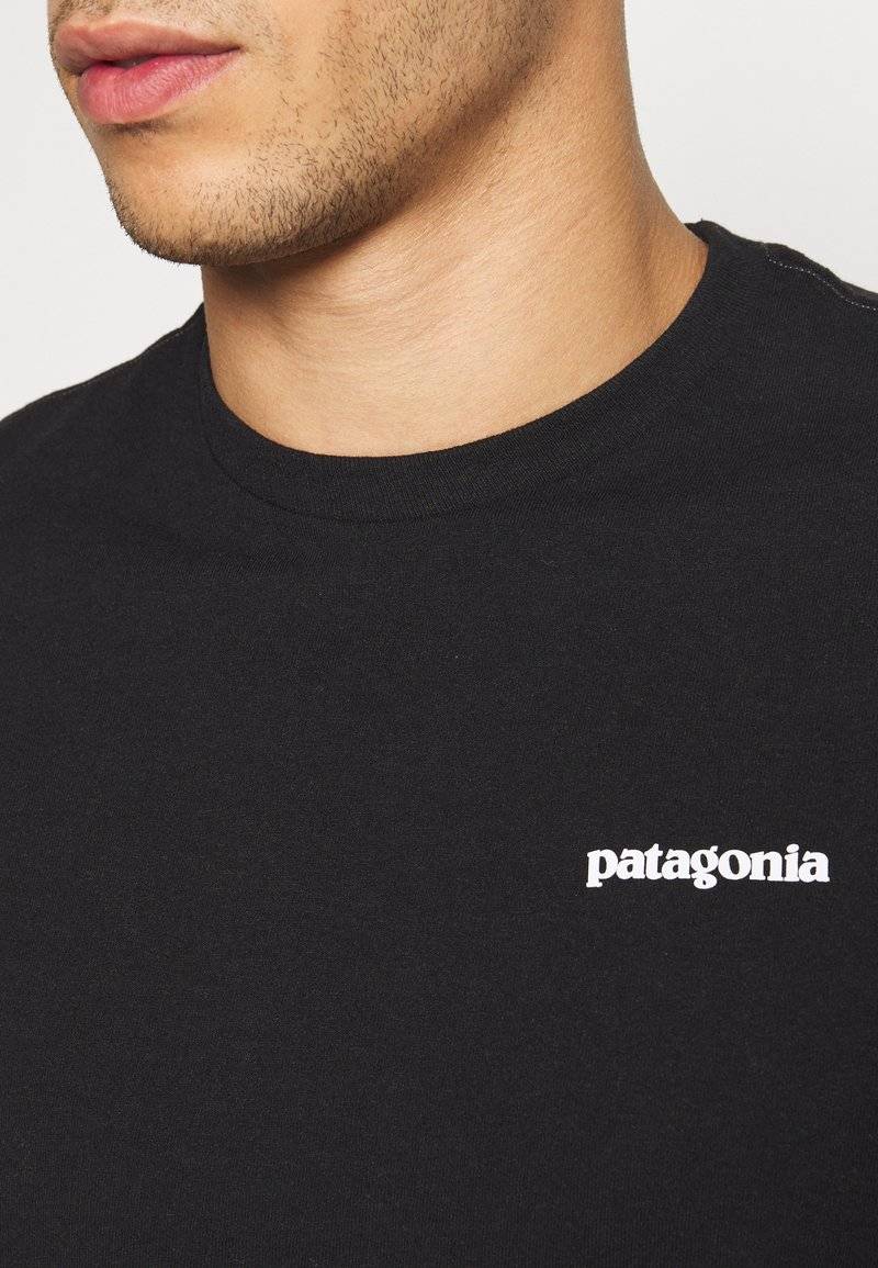 Patagonia Patagonia LOGO TEE - Print T-shirt - black Cyber Monday