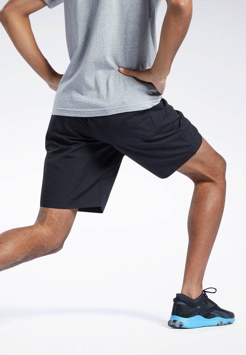 Reebok Reebok ID TRAIN UTILITY - Sports shorts - black Kauf eins, bekomm eins gratis