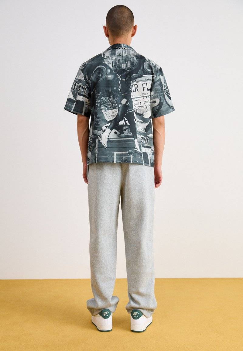 Nike Sportswear Nike Sportswear BUNGIE PANT - Tracksuit bottoms - grey heather Bis zu 55% Rabatt