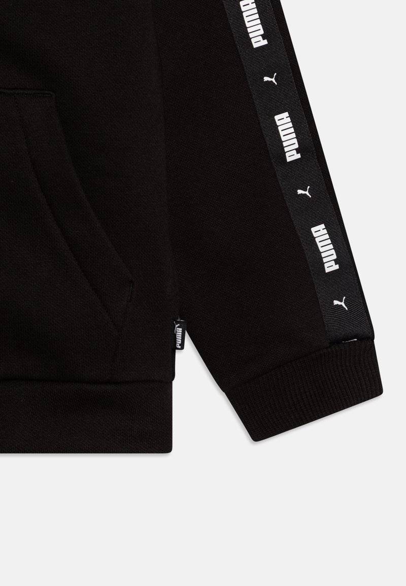 Puma Puma TAPE SWEAT SUIT UNISEX SET - Tracksuit - black Große Rabatte