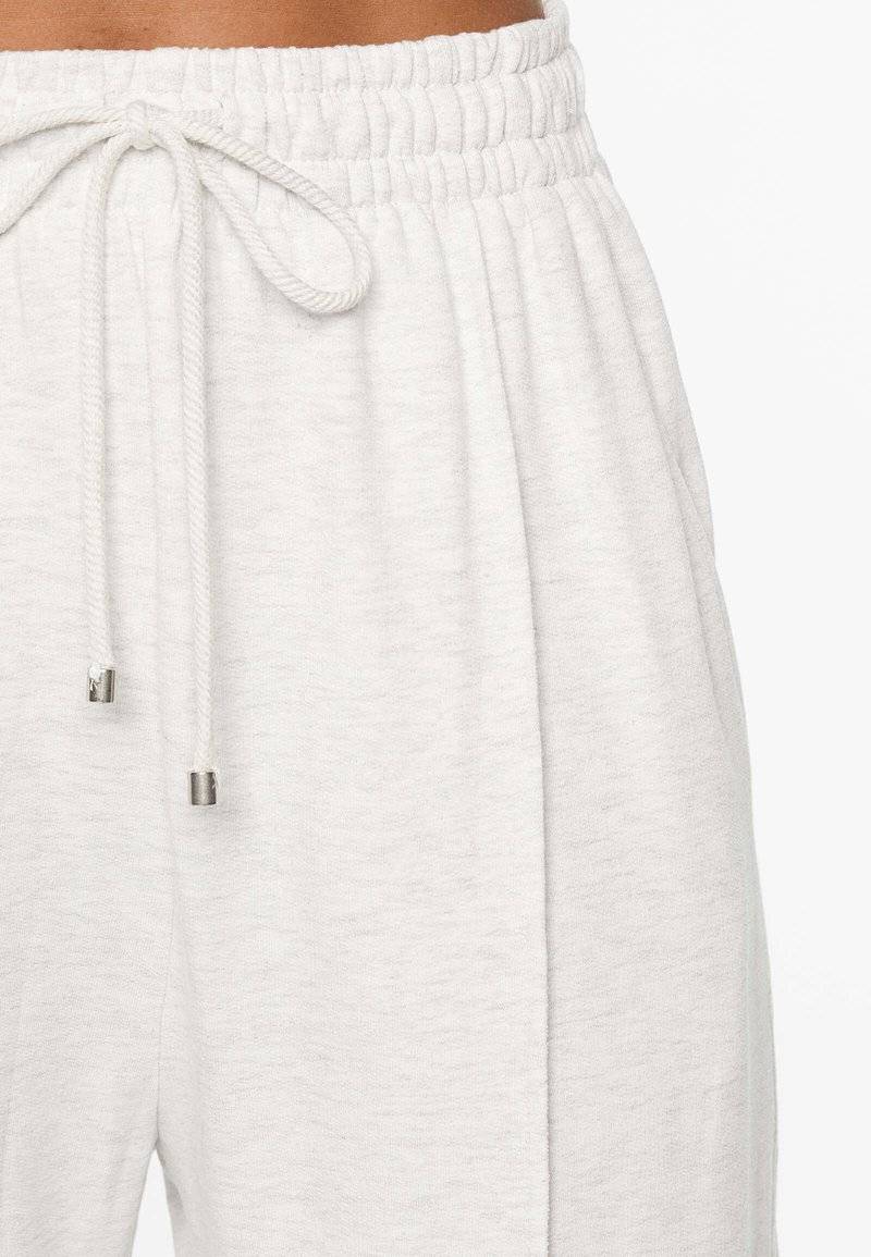 OYSHO OYSHO SOFT TOUCH RELAXED STRAIGHT-LEG - Tracksuit bottoms - mottled light grey Clearance-Verkauf