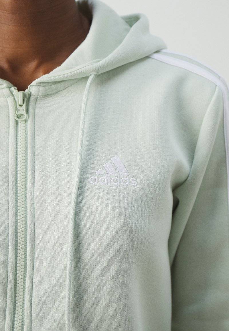 adidas Sportswear adidas Sportswear ESSENTIALS 3 STRIPES FULL ZIP HOODIE - Zip-up sweatshirt - linen green Riesige Rabatte