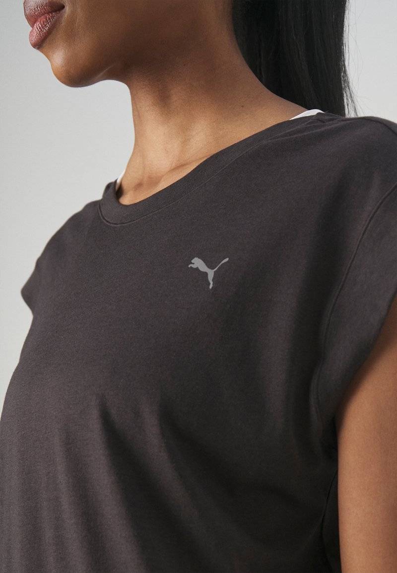 Puma Puma STUDIO FOUNDATIONS TEE - Sports T-shirt - black Vatertagsangebot