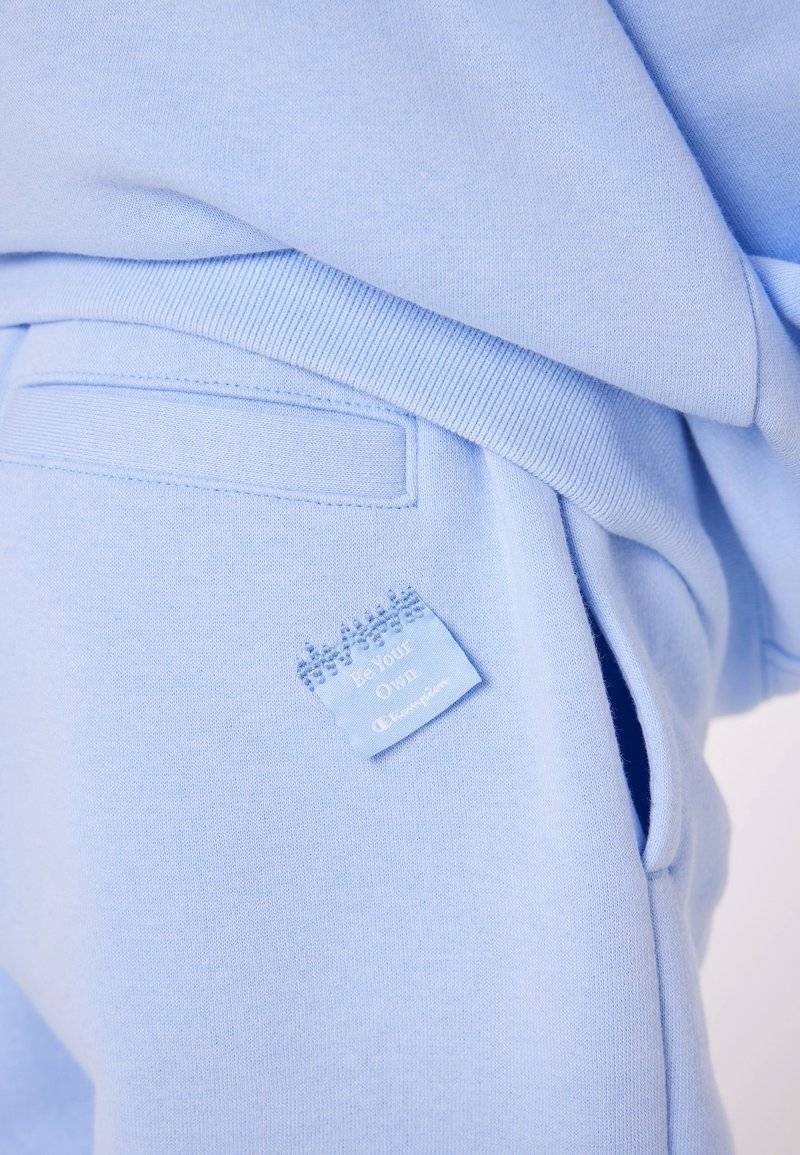 Champion Champion EXCLUSIVE PANT UNISEX - Tracksuit bottoms - light blue Bis zu 60% Rabatt