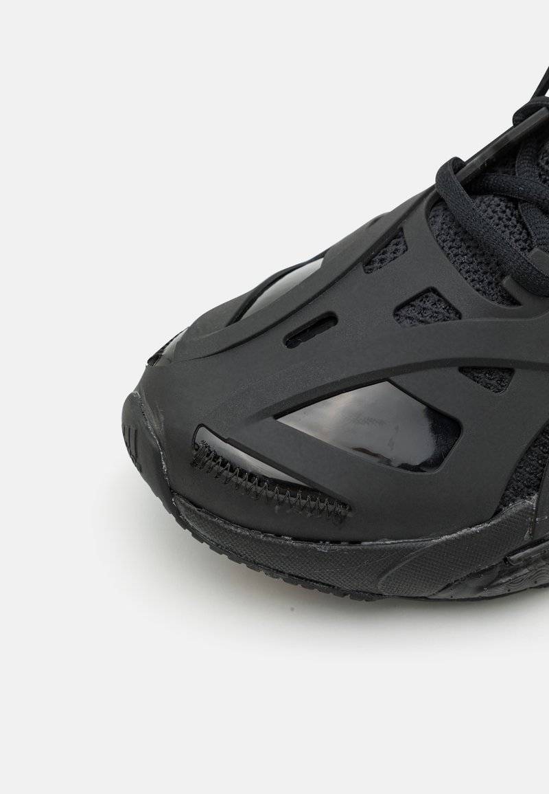 adidas by Stella McCartney adidas by Stella McCartney ADIDAS BY STELLA MCCARTNEY SOLAR GLIDE - Competition running shoes - core black Bis zu 65% Rabatt