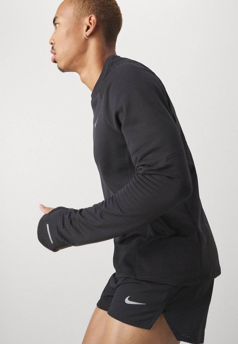Nike Performance Nike Performance FAST SHORT - Sports shorts zollfrei