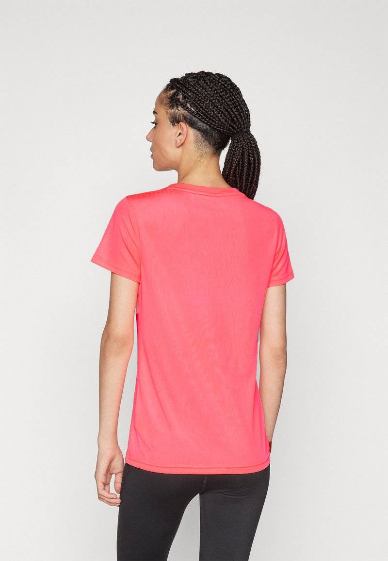 Puma Puma PERFORMANCE TEE - Sports T-shirt - sunset glow Preisnachlass