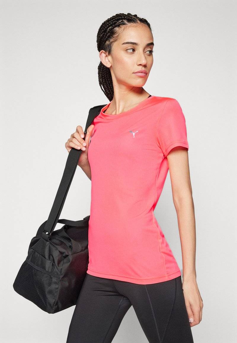 Puma Puma PERFORMANCE TEE - Sports T-shirt - sunset glow Preisnachlass