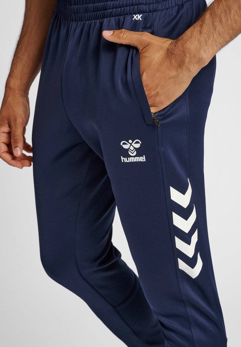 Hummel Hummel CORE XR TRAINING PANTS - Tracksuit bottoms - marine Jubiläumsangebot