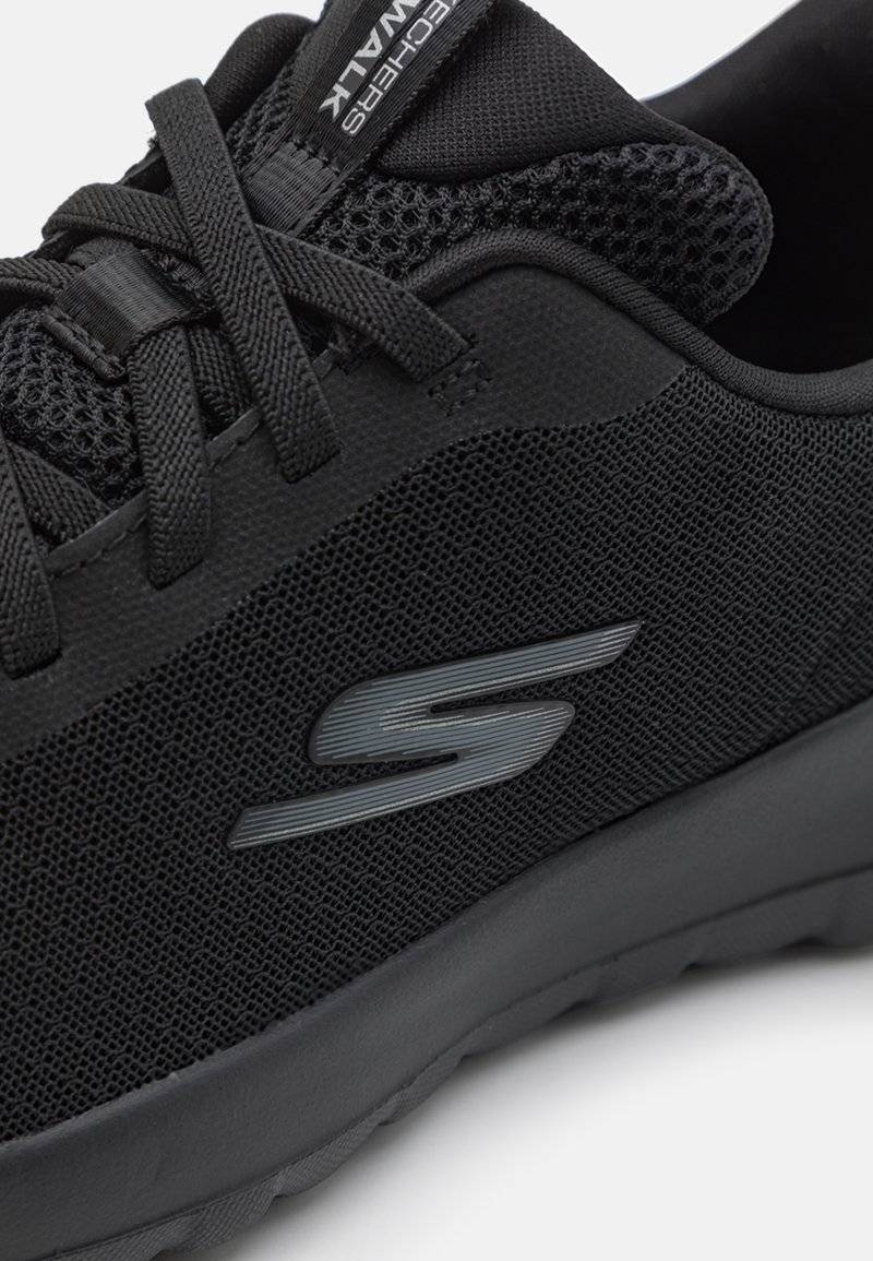 Skechers Performance Skechers Performance GO WALK BUNGEE - Walking trainers - black Zeitlich begrenztes Angebot